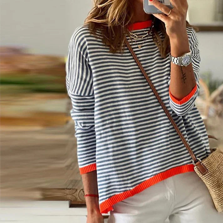 Navy and white striped long sleeve top with orange trim